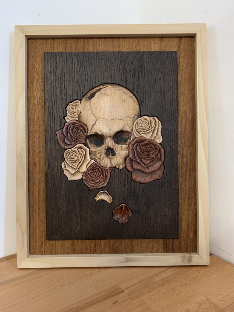 Unique skull and rose pyrography wood burning picture store plaque.